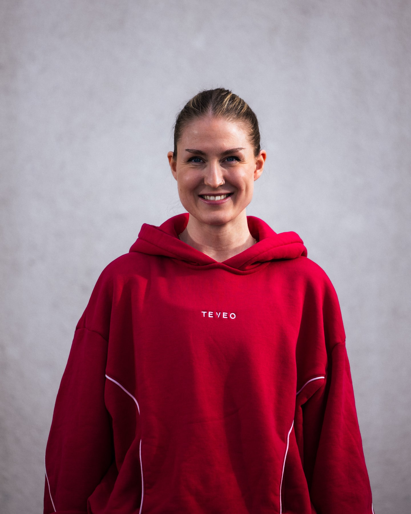 Smilende portrett av coach Maja West